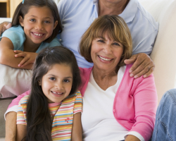 Grandparents posing with grandchildren